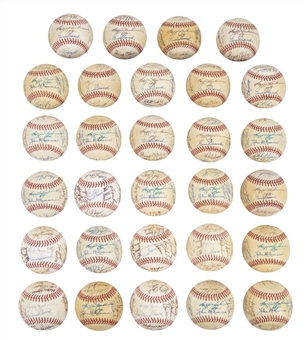 Lot of (29) Early 1980s Los Angeles Angels Team Signed OAL Brown Baseballs With Reggie Jackson (Autry LOA & Beckett PreCert)